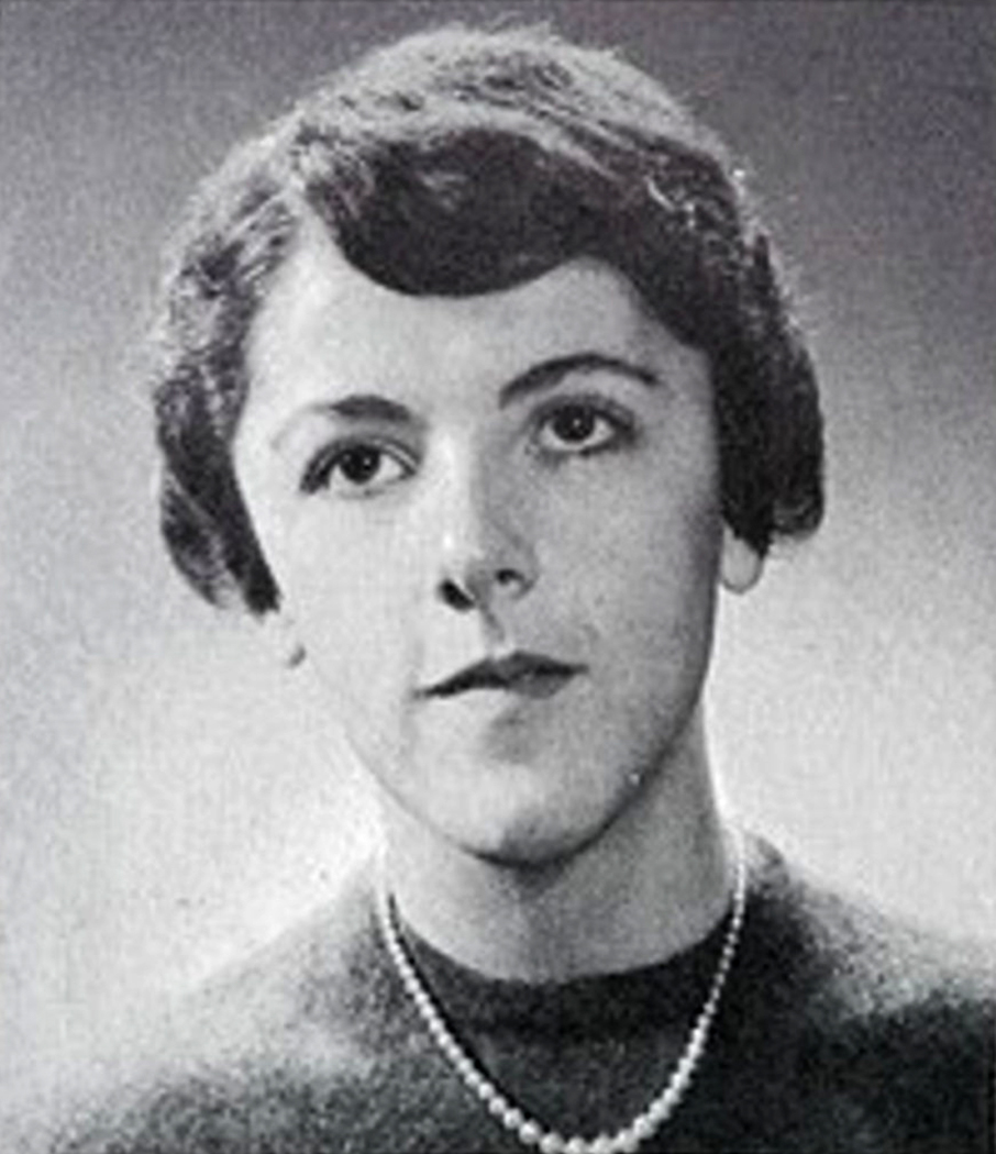 Yearbook portrait of Stanley Ann Dunham, a young woman with short dark hair, 1960.