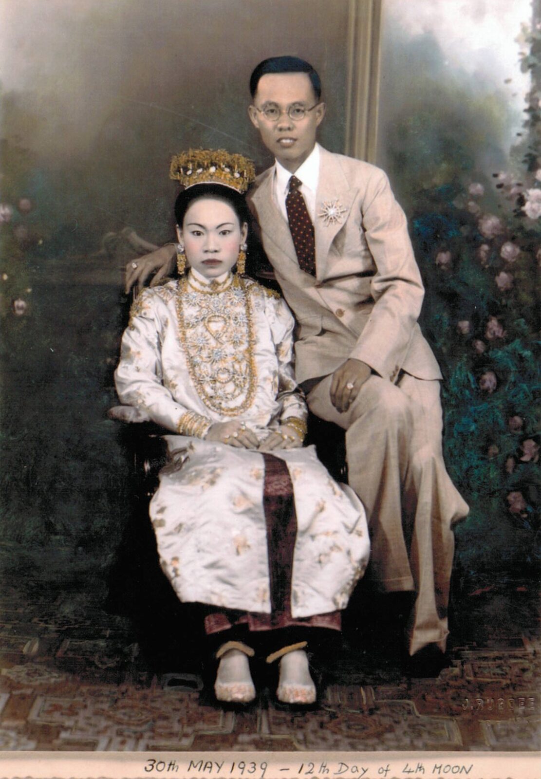 A Peranakan bride and groom in wedding dress, Singapore, 1939.