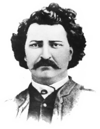 Engraved head-and-shoulders portrait of Louis Riel with curly hair and a moustache, about 1884.
